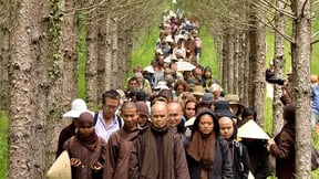 Plum Village Practice Center Thich Nhat Hanh leading walking meditation in Plum Village France 2014