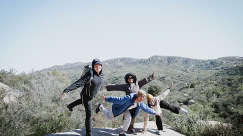 Posing in front of a mountain