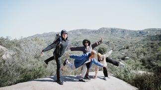 Posing in front of a mountain