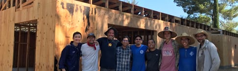 Group of volunteers building the monks residence