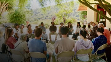 people dharma sharing in a circle