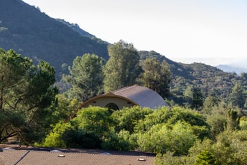 View of temple roof and mountains